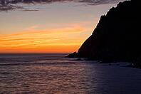 Sunset, sunset at sea, dramatic clouds, Cot Valley Beach, Porth Nanven, coast, St Just in Penwith, Cornwall, England, Great Britain, Great Britain [IBR125177989]