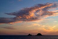 Sunset, sunset at sea, dramatic clouds, in the background rock formation The Brisons, Cot Valley Beach, Porth Nanven, coast, St Just in Penwith, Cornwall, England, Great Britain, Great Britain [IBR125177995]