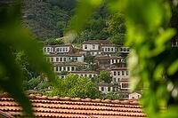 A panoramic view of the historic hillside village of Sirince with traditional white Ottoman houses [IBR125180374]