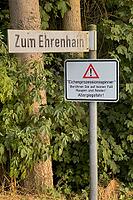 Warning sign in the forest with reference to oak processional spinner infestation, Guxhagen, Hesse, Germany [IBR125180387]