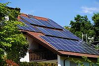 Country house with solar modules for photovoltaic and solar thermal panels on the large roof. Living in the countryside - the dream of owning your own home [IBR125185830]