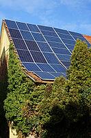 Solar panels on an old barn [IBR125185837]