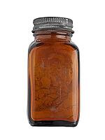 Vintage brown glass spice bottle over white, clipping path [IBR125188185]