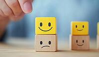 Customer Selects Happy Face Over Sad Face On Wooden Cube For Service Rating And Satisfaction. Close Up Shot Captures Decision, AI generated [IBR125200728]