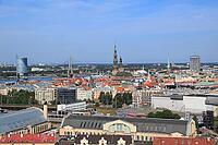 Old town with St. Peter's Church and St. Mary's Cathedral, Daugava with Vansubrücke, in front market halls, seen from the high-rise building of the Academy of Sciences, Riga, Latvia [IBR125203136]