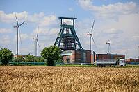 Abandoned Konrad 1 iron ore mine with conveyor framework, being converted into a repository for low and medium radioactive waste, wind turbines, Salzgitter, Lower Saxony, Germany [IBR125203159]