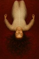 A woman in a white dress lies with closed eyes on a reddish background, creating a serene and dreamlike atmosphere, AI generated [IBR125203228]