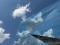The 'cube Berlin' is a spectacular, cube-shaped office building on Washingtonplatz, right next to Berlin Central Station. It was completed in February 2020 and is considered one of the most innovative and smart buildings in Europe. The glass façade reflec [IBR113322299]