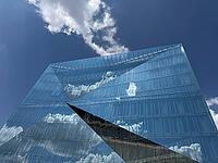 The 'cube Berlin' is a spectacular, cube-shaped office building on Washingtonplatz, right next to Berlin Central Station. It was completed in February 2020 and is considered one of the most innovative and smart buildings in Europe. The glass façade reflec [IBR113322301]