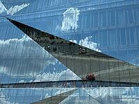 The 'cube Berlin' is a spectacular, cube-shaped office building on Washingtonplatz, right next to Berlin Central Station. It was completed in February 2020 and is considered one of the most innovative and smart buildings in Europe. The glass façade reflec [IBR113322302]