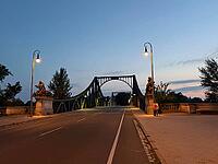 The Glienicke Bridge, also known as Agent's Bridge in GDR times and is world-famous, as captured secret agents were regularly exchanged here between West and East. Back then, the border between West Berlin and the GDR ran right in the middle of the bridge [IBR113322306]