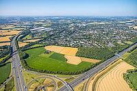 Aerial view, Kamener Kreuz motorway junction, A1 motorway and A2 motorway, possible and planned route for regional railway between Kamen and Bergkamen, railway infrastructure, road traffic and truck traffic, Kamen, Ruhr area, North Rhine-Westphalia, Germa [IBR113322310]