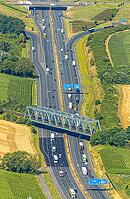 Aerial view, A2 motorway near Kamener Kreuz motorway junction, highway A1 and motorway A2, road traffic and truck traffic, Kamen, railway bridge, bridges, Ruhr area, North Rhine-Westphalia, Germany, motorway, BAB, motorway junction, air suspension, overvi [IBR113322312]