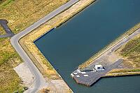 Aerial view, water town of Aden on the Datteln-Hamm Canal, Aden conveyor tower, view of Bergkamen Ktaftwerk, Aden water city on the Datteln-Hamm Canal, building area for planned urban district on the site of the former Haus Aden colliery, Oberaden, Bergka [IBR113322334]