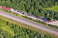 Aerial view, tire storage and tire recycling Arnold an der Werner Straße, railway tracks, commercial space, old tires, Bergkamen, Ruhr area, North Rhine-Westphalia, Germany, birds-eyes view, aerial photography, aerial photography, overview, bird's eye vie [IBR113322368]