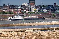 Rhine near Emmerich, extreme low water, Rhine level at 5 cm, downward trend, cargo ships sometimes only have to travel with 30 percent of the usual load, backdrop of the Emmerich waterfront, North Rhine-Westphalia, Germany [IBR113322397]