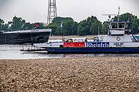 Extreme low tide level on the Rhine, after the driest and warmest July, since the weather was recorded, level record low, the banks are falling dry, shipping can only travel with reduced load and speed, Duisburg-Walsum, ferry terminal of the car and passe [IBR113322437]