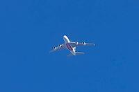 Airbus A380 jet passenger aircraft of Emirates airlines flying in a blue sky, England, United Kingdom [IBR125204161]