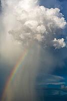 Rain and rainbow during the rainy season in the Kalahari Desert, Kgalagadi Transfrontier Park, South Africa [IBR125204169]