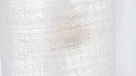 Sheer curtain fabric weave with a barely perceptible residue tint in one section, indoor smoke contamination concept, studio shot, AI generated [IBR125211468]