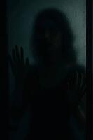 A silhouette of a woman with hands on glass, casting a mysterious shadow, AI generated [IBR125211553]
