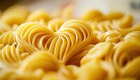Heart-Shaped Multied Pasta On A White Plate: Perfect Holiday Dish For Cooking Enthusiasts, AI generated [IBR125229935]