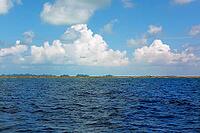Cumulus clouds above on the horizon Chelbacheb Islands Rock Islands 70 Seventy Islands of island paradise Palau, island state of Palau in the West Pacific, Pacific, Republic of Palau, Micronesia, Australia, Oceania [IBR125237471]