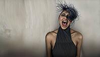 A primal scream. A woman expressing anxiety, mental health issues, internal pain or distress, migraine headaches. Inability to control real or inernal or outside circumstances and emotions. Copy space, AI generated [IBR125237533]