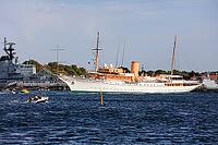 Royal yacht Kongeskibet Dannebrog in front of Copenhagen Naval Station on Nyholm, seen from Langelinie, Copenhagen København, Zealand Sjælland, Denmark, Baltic Sea [IBR125242435]