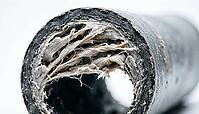Abstract macro of pipe wall material caught mid-flex under sudden internal pressure, water hammer deformation process, studio shot, AI generated [IBR125242462]