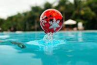 New year tree decoration in the water, christmas decoration in blue water in tropics [IBR125261594]