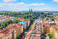 Roofs of Prague old buildings and the Basilica of St Peter and St Paul on the background [IBR125261605]