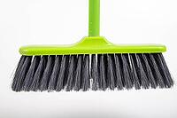 A new cleaning broom. Accessories to keep things tidy. Light background [IBR125261612]