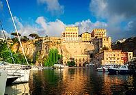 Boats embankment and city of Sorrento, southern Italy, retro toned [IBR125261619]