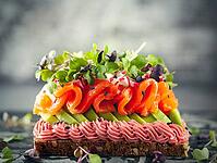 Gourmet sandwich with smoked salmon, avocado, beet hummus and sprouts. Concept healthy eating. Festive appetizer [IBR125261642]