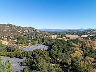 Aerial view of Campsites in the valley of Dos Picos County Park in Ramona, South California, USA [IBR125280325]