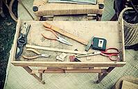 Tools for handicraft work on wooden table [IBR125280330]