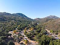 Aerial view of Campsites in the valley of Dos Picos County Park in Ramona, South California, USA [IBR125280367]