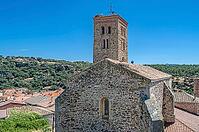 Aerial view of the Church of Santa María del Castillo in Buitrago del Lozoya, Community of Madrid, Spain, completed in 1321, in Gothic-Mudejar style, with a stork nest on the roof [IBR125280382]