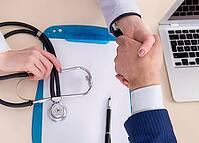The man who signs the health insurance contract [IBR125304615]