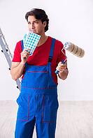 Young handsome contractor working indoors [IBR125304635]