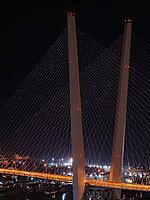 Night view of the bridge in the Russian Vladivostok over the Golden Horn bay [IBR125304664]