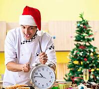 The young chef works in the kitchen on Christmas Eve [IBR125331128]