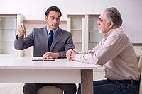 Male real estate agent and male client in the apartment [IBR125331132]
