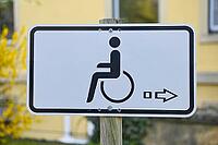 Parking sign in front of a hospital [IBR125344282]