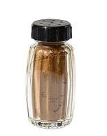 Transparent glass jar with ground cinnamon on a white isolated background, spice [IBR125344288]