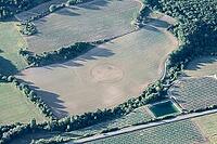 Humorous smiley emoticon on a harvested green field of Provence, France [IBR125344329]