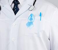 On the pocket pinned a blue ribbon in the shape of a loop, symbol of the fight and treatment of prostate cancer [IBR125363562]