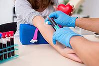 Young woman in blood transfusion concept [IBR125363593]