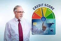 The businessman in the credit score concept [IBR125382596]
